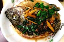 Lao Gan Ma's Recipe for Braised Tilapia with Garlic Sprouts, Celery, and Stuffed Fish