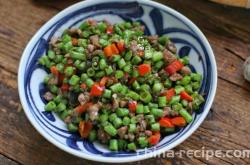 The method of stir frying minced green beans with minced meat