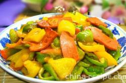 The method of stir frying ham with colored peppers