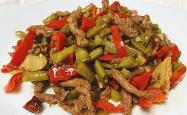 The method of stir frying beef with sour beans and ginger