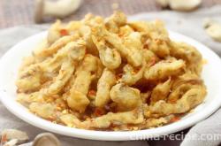 The method of dry frying fresh mushrooms