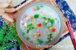 How to make diced chicken colorful Congee