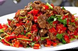 The method of stir frying beef with chili pepper