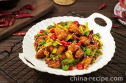 The method of stir frying diced chicken