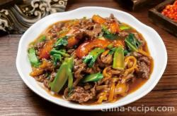 The method of stir frying beef strips with yellow celery