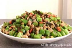 The method of stir frying green beans with minced olive vegetable and minced meat