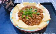 The method of steaming eggs and tofu with minced meat