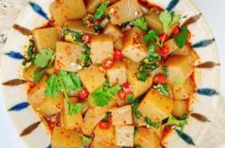 The method of stir frying konjac tofu with green garlic