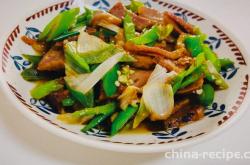 The method of stir frying pork with scallions