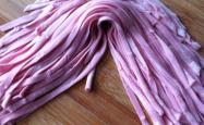 Method of hand rolling dragon fruit noodles