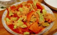 The recipe for stir frying cauliflower with tomatoes