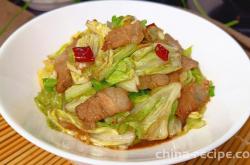 The method of stir frying pork with cabbage