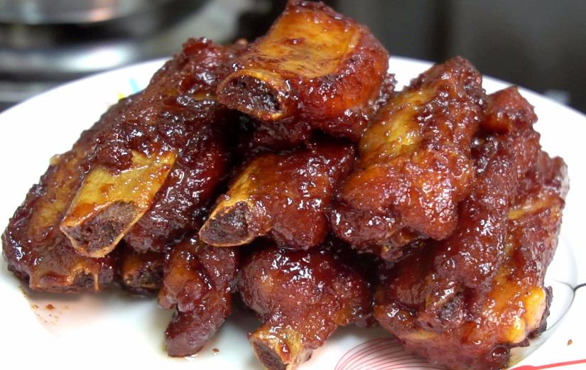 The recipe for braised pork ribs with honey sauce