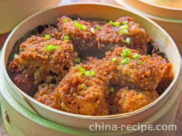 The recipe for steamed pork ribs with flour