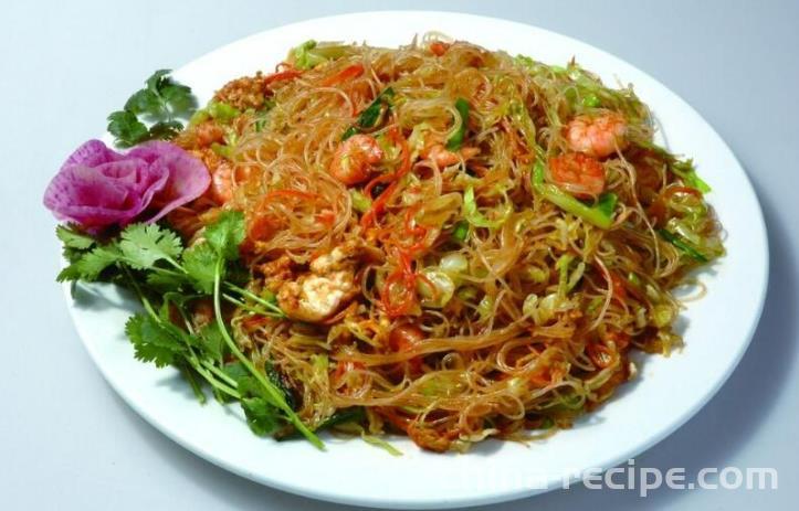 The method of stir frying seafood mushrooms and shredded meat with noodles