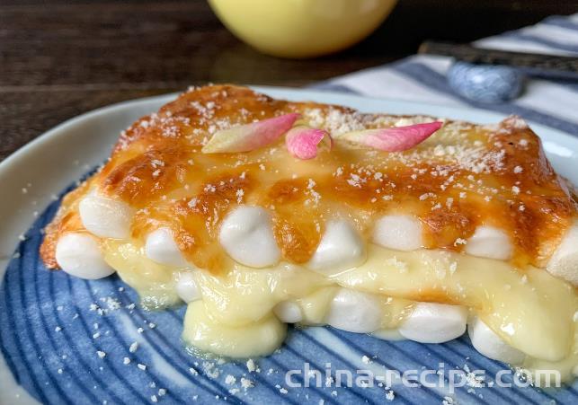 The preparation of brushed cheese rice cake