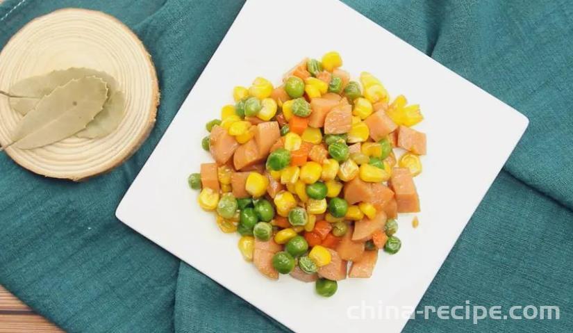 The method of stir frying diced carrots, corn kernels, and green beans