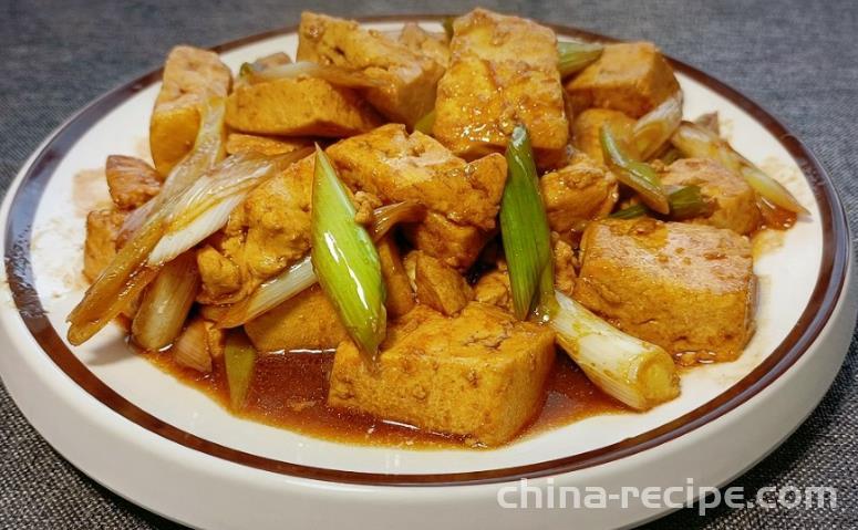 The method of stir frying tofu with scallions