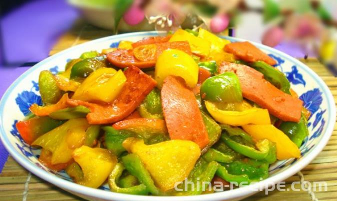 The method of stir frying ham with colored peppers