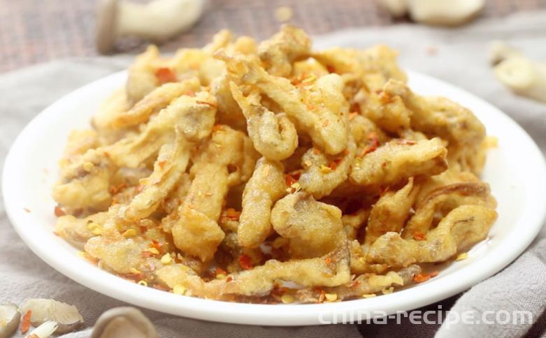 The method of dry frying fresh mushrooms