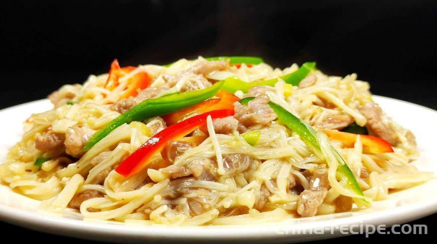 The method of stir frying shredded pork with shiitake mushrooms