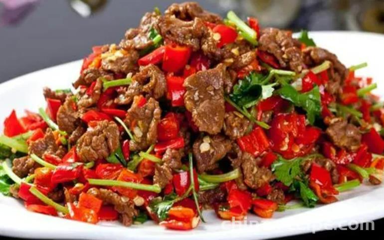 The method of stir frying beef with chili pepper