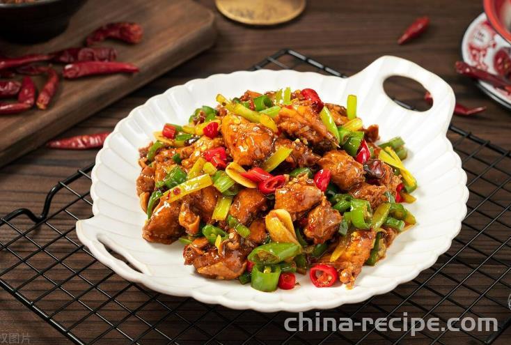 The method of stir frying diced chicken