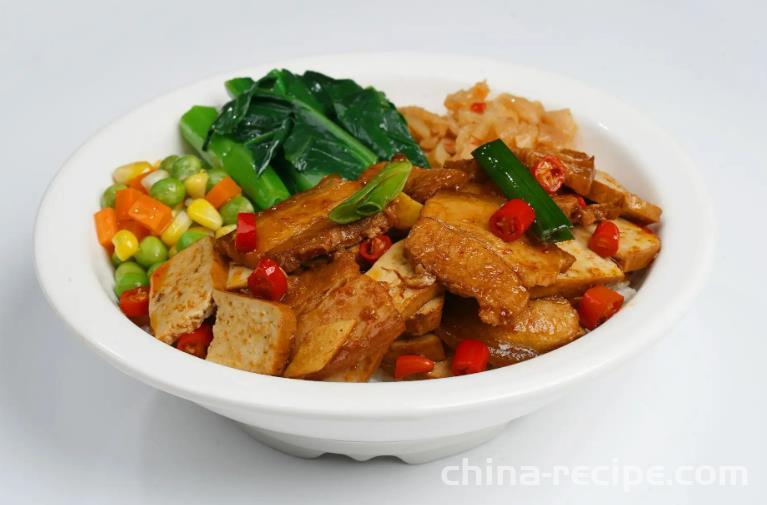 The method of stir frying dried pork in You County