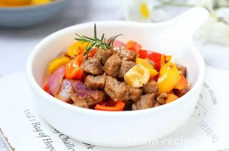 The method of stir frying beef with colored peppers