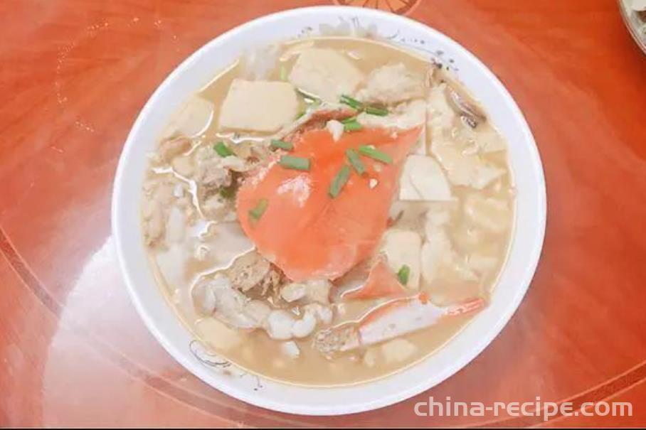 The method of cooking tofu and river crab at home